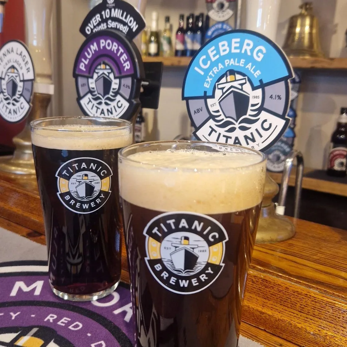 Two pints of Titanic ale at the bar
